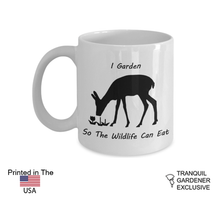 White glossy mug with wildlife gardening quote and nature design