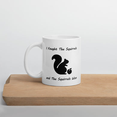 White ceramic garden mug with funny squirrel quote for gardeners